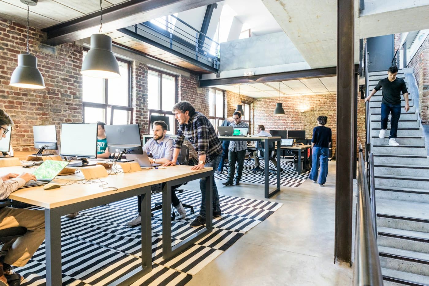 Founders planning a business launch around a table